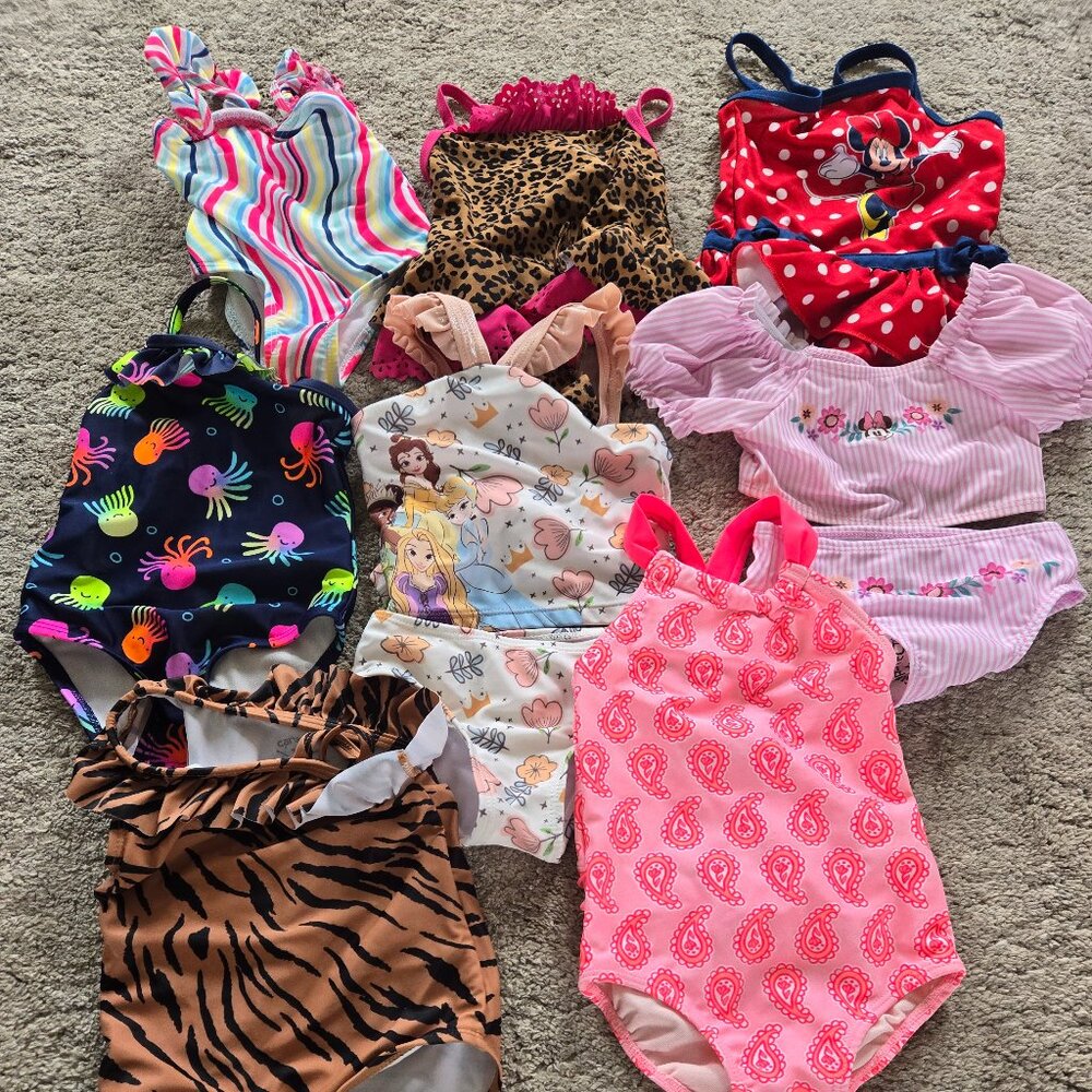 $15.00 for 8 Little Girls Size 18 months swimsuits